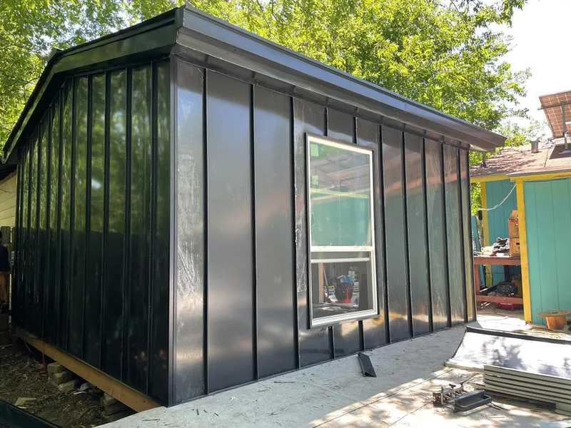 Black standing seam metal wall panels for Roof Inspection in Mecca